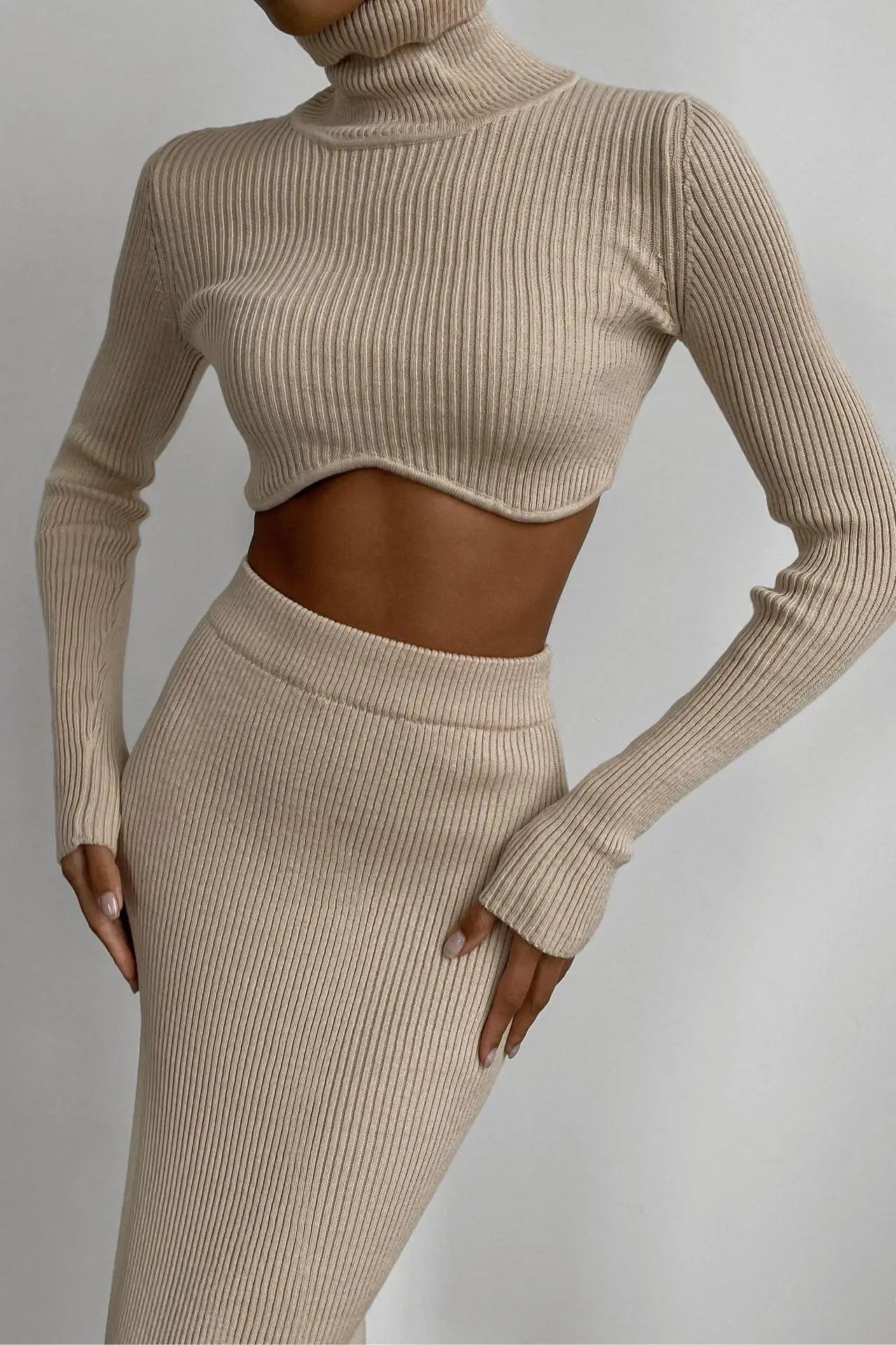 image_396_Chic_Women_Knitted_Set_Crop_Tops_and_Skirt_Clothing_Autumn_Winter_YK_Slim_Sexy_Street_Fashion__Two_Piece_Outfits_1.webp